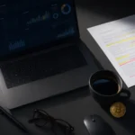 Affiliate marketer reviewing a casino partner program's revenue share terms on a laptop dashboard